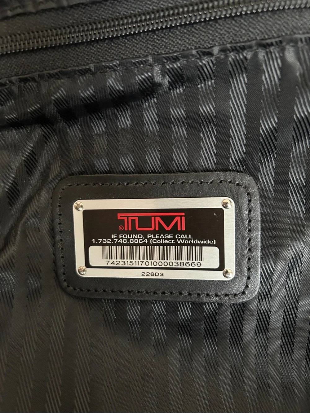 Tumi leather luggage